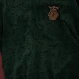 It’s a baby yoda hoodie green with little baby yoda’s over it